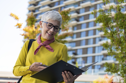 Woman reading the latest research about menopause